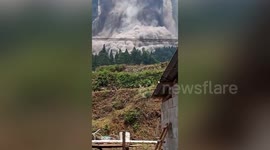 People sent running for cover when mountainside collapses in southern China