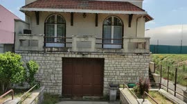 Pareidolia in Paris suburb. Smiling house. Rue Amedee Huon, Vitry-sur-Seine, France. 9 may 2022