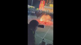 Vietnamese festival sees dancers hop across burning embers