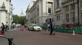 Police Roadblock and Helicopters with Big Ben in background for Westminster Security Alert, corner of Horseguards and Birdcage Walk