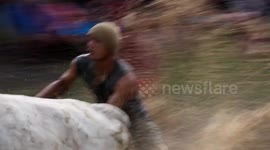Scram-burger: Racing cows delight locals celebrating Eid in Indonesia