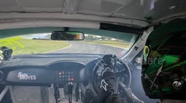 Pro car driver manages to maintain control of drift despite loosing a wheel