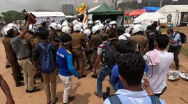 Curfew imposed after deadly protests between pro-government and anti-government groups in Sri Lanka
