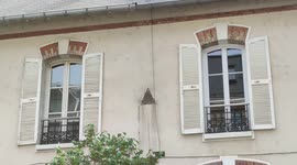 Pareidolia. Paris suburb.House with triangle nose and rectangle mouth. France 10 may 2022. Rue Bourgelat, Maisons-Alfort