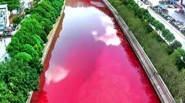 Officials unclear as to why river turns red in southern China