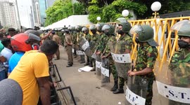 Curfew imposed in Sri Lanka after political clashes in capital and resignation of PM