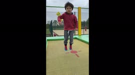 This boy just loves bouncing up and down on the trampoline