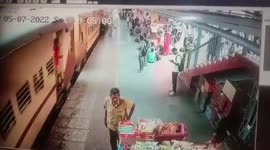 Cop rescues woman getting dragged by moving train in northern India