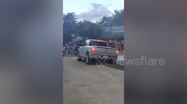 Bungling pickup driver gets stuck in wet cement