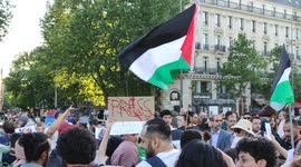 France calls for investigation into Al Jazeera journalist's death as crowd gathers in Paris to pay tribute