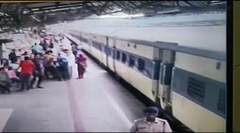 Indian security personal rescue two women who tried to be boarded the train in Eastern India.
