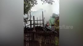 Villagers put out fires on homes 'set alight by military' in Myanmar