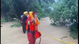 Firefighters rescue elderly man from flooded house in southern China