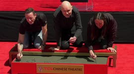 Smashing Pumpkins cement their handprints at Chinese Theatre ceremony in Hollywood