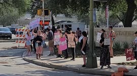 Activists protest the overturn Roe vs Wade.
