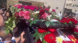 Body of Al-Jazeera journalist Shireen Abu Akleh arrives at hospital in east Jerusalem neighbourhood of Sheikh Jarrah