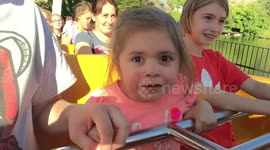 Scared girl on roller coaster