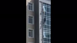Brave man's rescue of toddler hanging from window earns him award