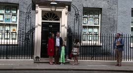 Nazanin Zaghari-Ratcliffe and family pose on steps of Number 10 before meeting with PM
