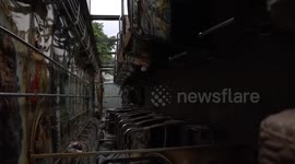 Buses damaged by protesters on the streets of Colombo, Sri Lanka