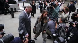 Coleen Rooney, Wayne Rooney and Rebekah Vardy arrive at the Royal Courts of Justice on Monday
