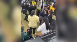 Amazing moment mourners break into dancing during DJ set at funeral