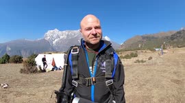 UK dad becomes first person with motor neurone disease to skydive over Mount Everest