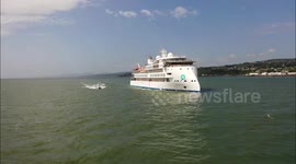 Drone footage of beatiful cruise ship with unusual bow structure - bird watching trip