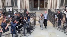 Coleen Rooney leaves court with husband Wayne on Monday