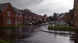 Lightning and heavy rain in Harrogate housing estate North Yorkshire UK