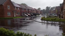 Heavy rain and thunder in a Harrogate new housing estate North Yorkshire UK