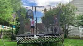Girl flips on trampoline