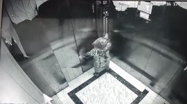 Little girl trapped in lift when her umbrella gets jammed between doors