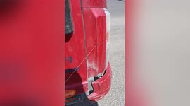 Chinese motorist shocked after kite string slices into truck