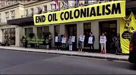 Extinction Rebellion activists storm London's May Fair Hotel hosting oil summit