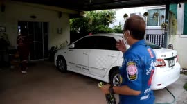 Rescue teams battle cobra hiding under car engine