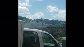 US: Garbage Truck Catches Fire On Liberty Bridge Causing Traffic Jams