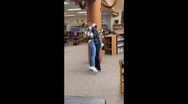 Teacher surprised with heartwarming wedding proposal at work