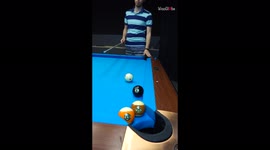 'Pool shark defies all odds by unleashing the 'double kiss' to pot the 8-ball '