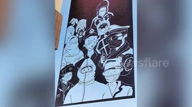 Chinese man cuts pandemic heroes' images out of paper to show respect