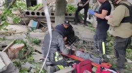 Ukraine emergency services tend to 9-year-old boy found underneath rubble of destroyed building in Bakhmut, Donetsk