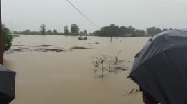 Stranded in floods, people rescued by boat in northeastern India