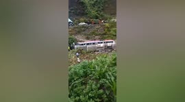 One killed after bus falls into ditch in southern China