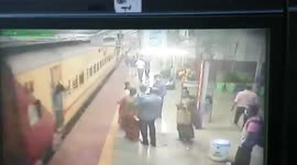 Passenger falls boarding moving train, alert cop pulls him to safety in dramatic rescue in western India