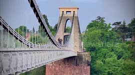 Two base jumpers seen jumping off one of Britain's most iconic bridges