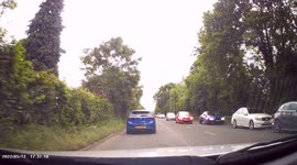 DASHCAM - Boy Racer in Red Golf GTI jumps red light, nearly crashing into turning coach!