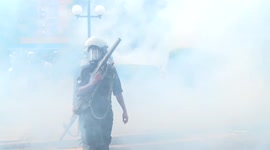 Protest turns violent as police fire tear gas and water cannons on students protestors in Sri Lanka