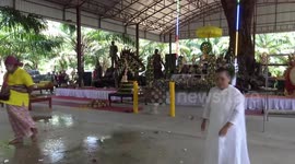 'Possessed' students roar like wild animals during bizarre religious ceremony in Thailand
