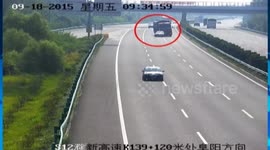 Car stops on highway and truck smashes into it