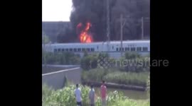 Factory fire near high-speed rail line in Shanghai